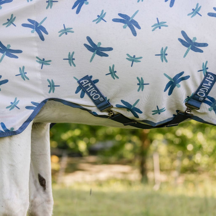 A close up of a grey pony wearing the Horseware Ireland Amigo Bug Rug Plus Pony Fly Sheet in a dragonfly print, focus on the 2 belly straps, or surcingles.